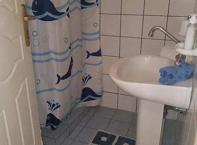 Апартаменты Under The Red Rock And View